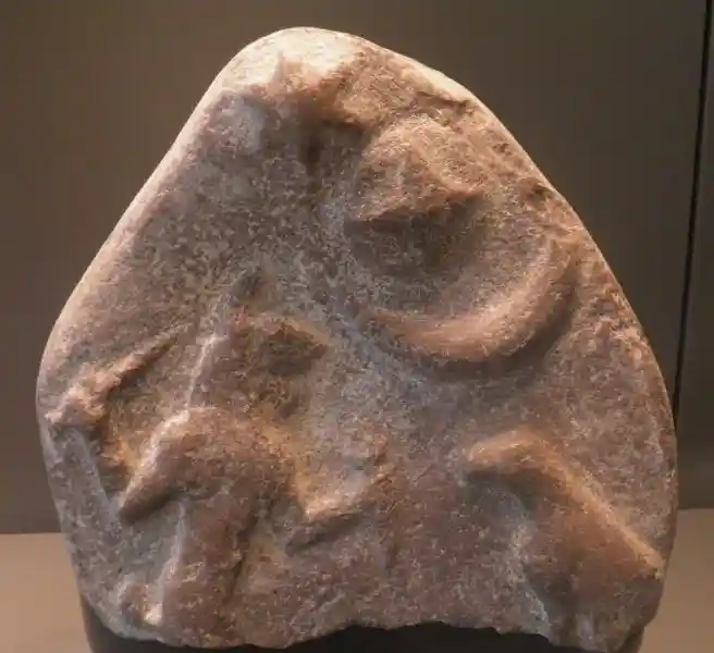 Solar cross on top of a crescent